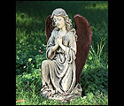 praying winged angel kneeling