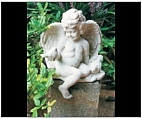 Little Cherub Boy with Bird Figurine