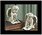 Pair of Reading Cherub Figurines