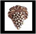 Our grape door knocker is a nice addition to the front door with its detailed craftsmanship. In fact, it is a great addition for anyone looking for unique grape decor. Made of solid brass.