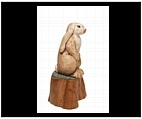 Rabbit Sculpture on Bark Stump