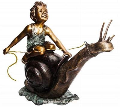 Boy Riding a Snail Sculpture