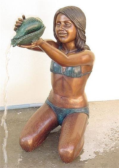 Beach Girl with Shell Sculpture