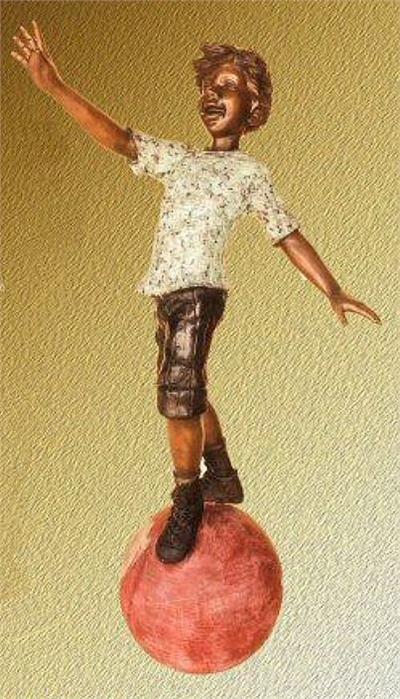 Boy on Ball Statue