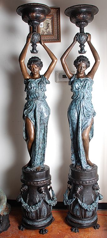 Pair of Women Sculptures Carrying Trays