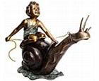 Boy Riding a Snail Sculpture