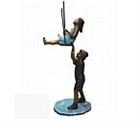 Brother Swinging Sister Life Size Sculpture