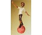 Boy on Ball Statue