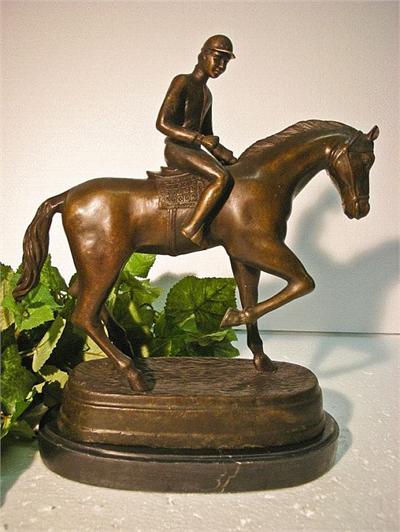 Bronze Man on Horse Sculpture