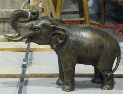 Little Elephant with Raised Trunk