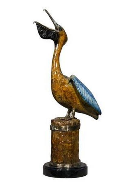 Colorful Pelican on Pole Sculpture