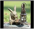 Smart Reading Rabbit and Candle Lantern Statue